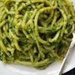 Pasta al Pesto with Chicken,    Sun Dried Tomatoes, & Artichoke Hearts